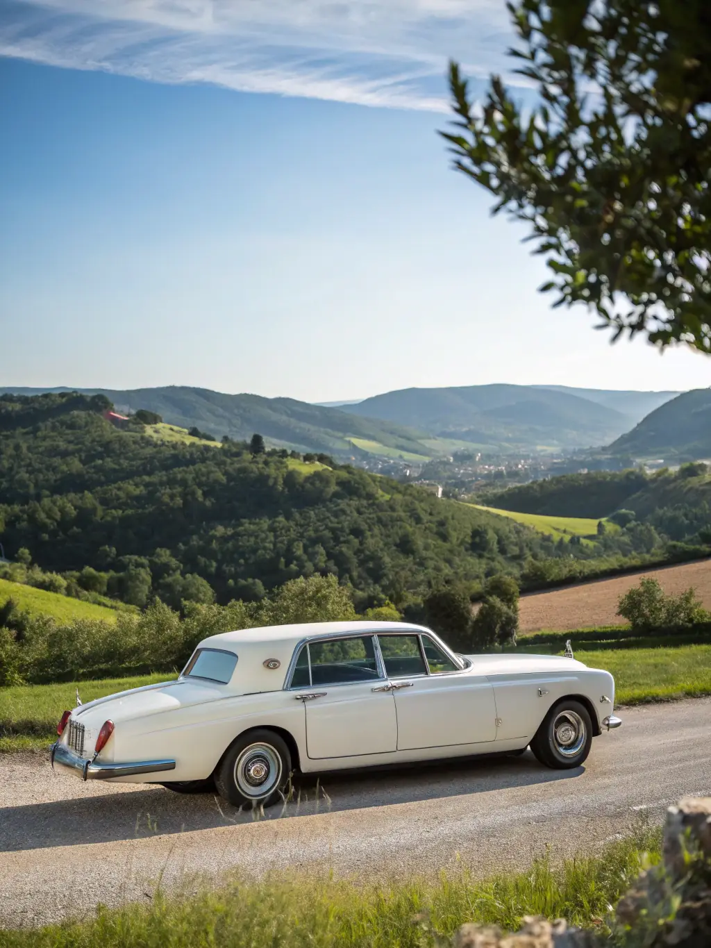 A luxurious Rolls-Royce Phantom, elegantly parked outside a high-end boutique, highlighting its opulence and status.